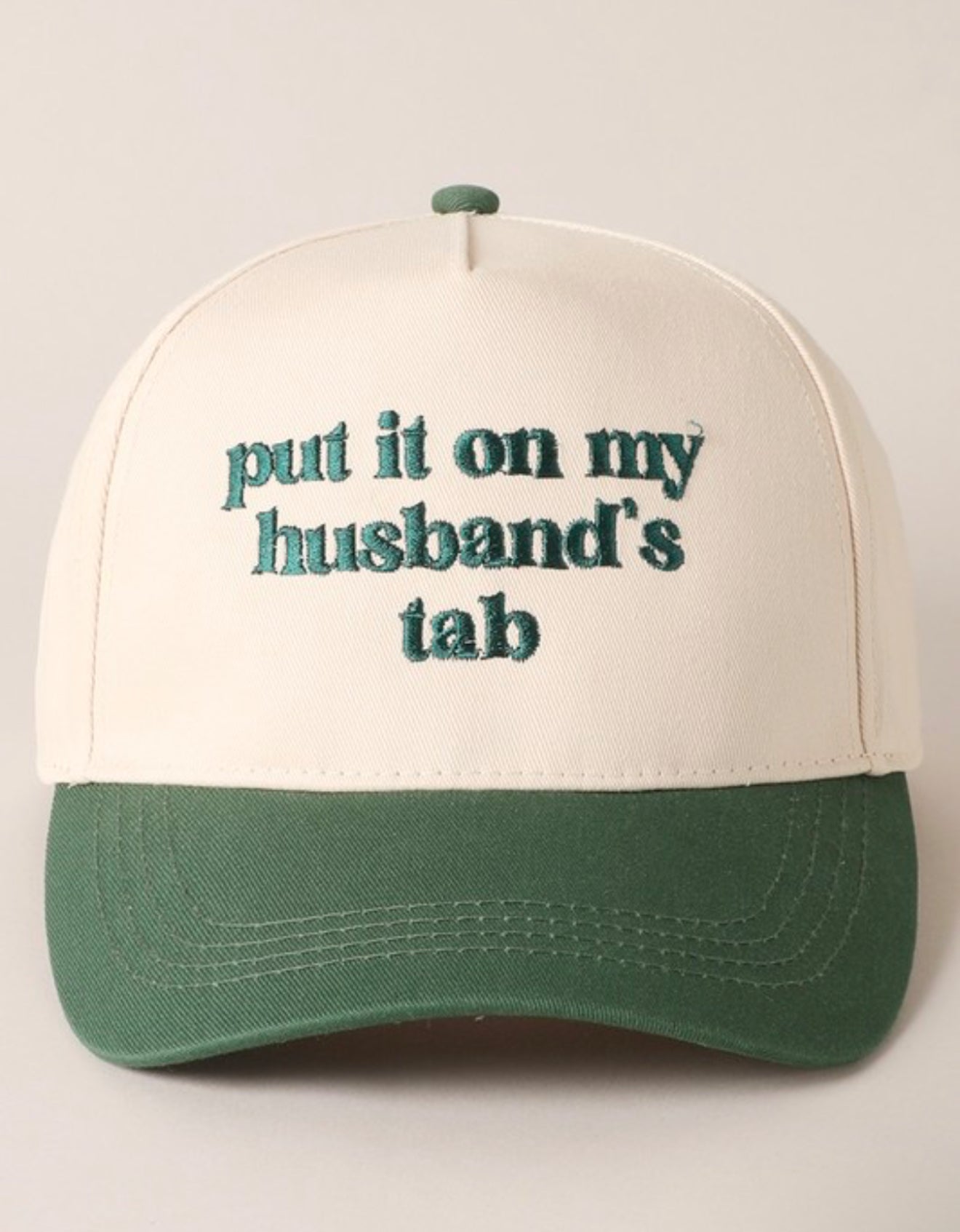 Put It On My Husband’s Tab Trucker Hat