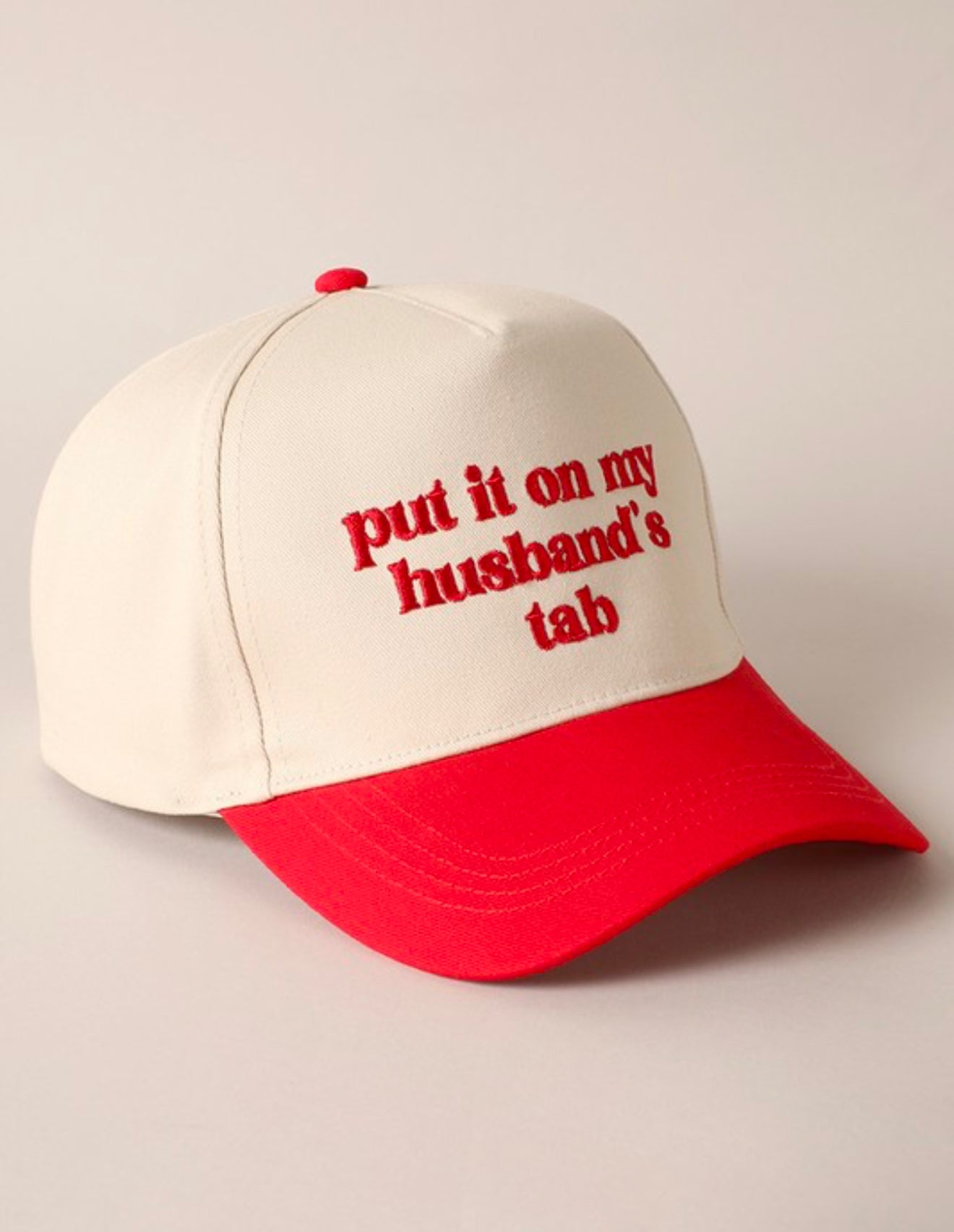 Put It On My Husband’s Tab Trucker Hat