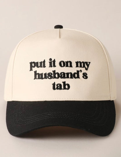 Put It On My Husband’s Tab Trucker Hat