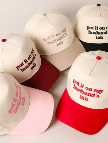 Put It On My Husband’s Tab Trucker Hat