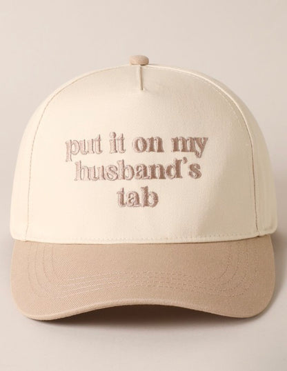 Put It On My Husband’s Tab Trucker Hat